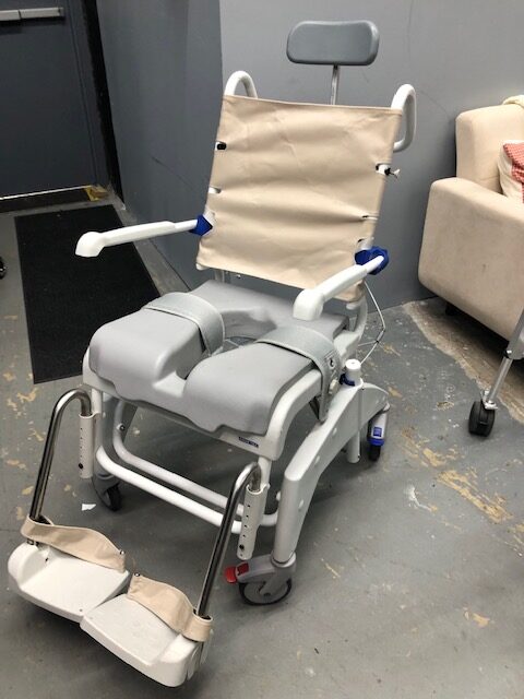 Ocean VIP tilt rolling shower/commode chair, 18" wide