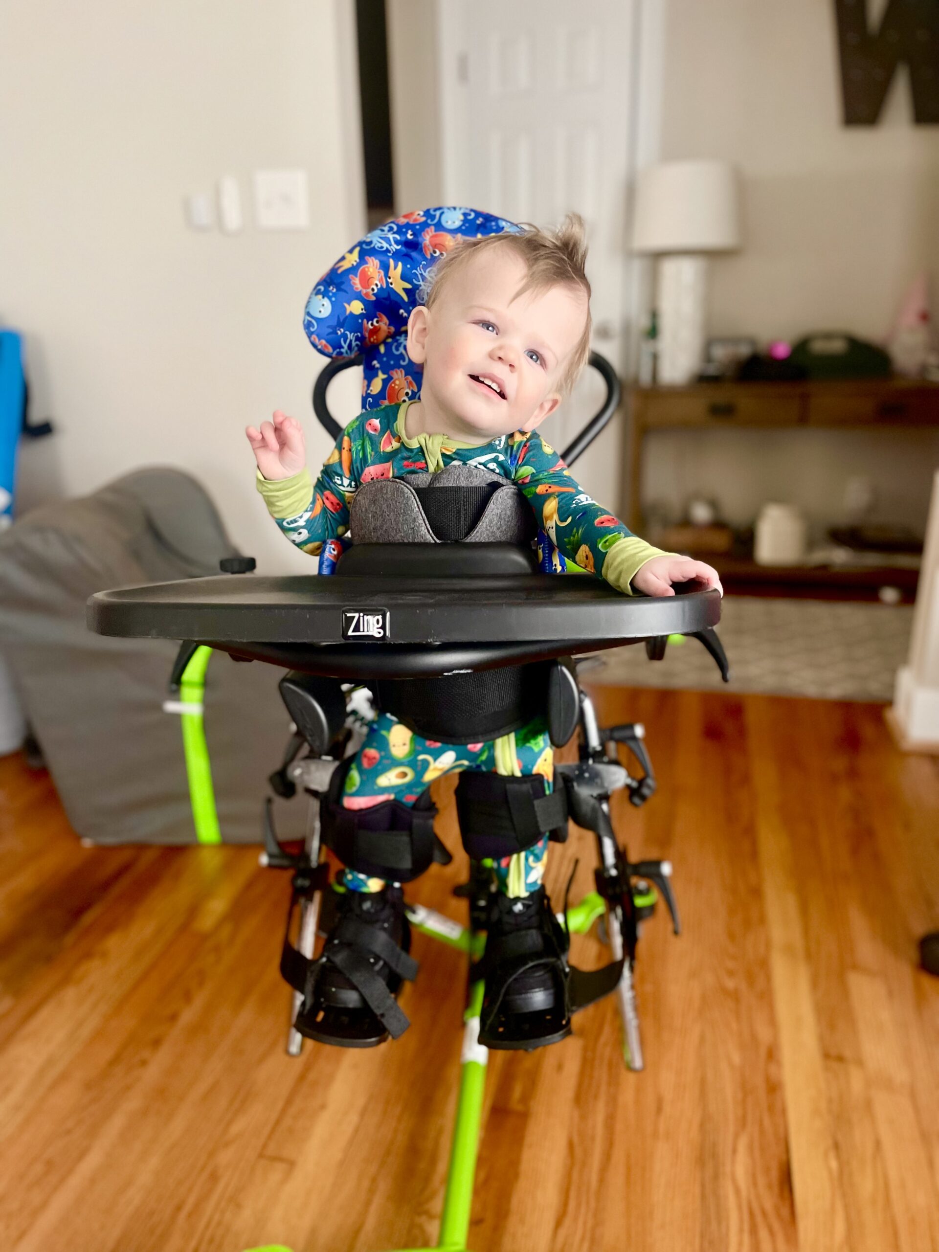 Child using assistive device